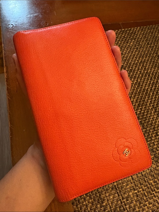 CHANEL Handbags - CHANEL Coral Embossed Soft Leather Long Wallet with Camellia Detail